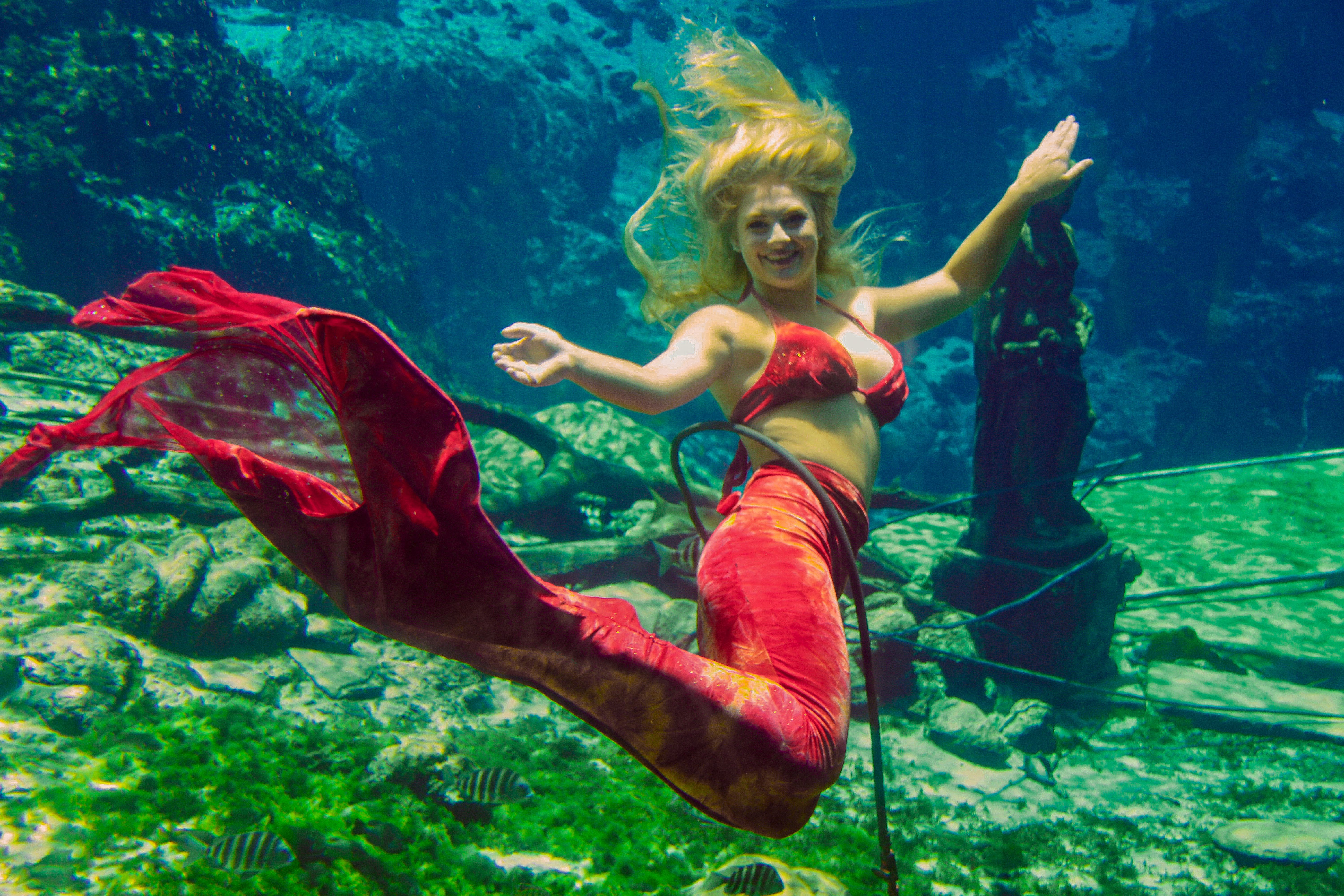 Mermaids perform choreographed routines while working against a 5 m.p.h. updraft from the one-million gallons that gush from the spring daily.
