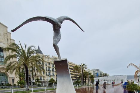 The sculpture continues to be covered with flowers