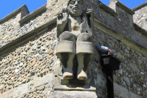 This unusual St. Peter wears wellies.
