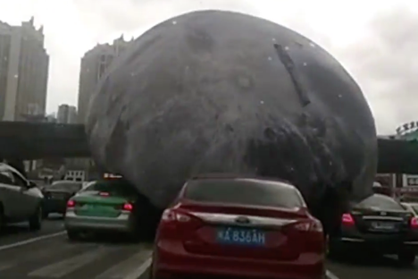 Check Out This Massive Moon Balloon Terrorizing Streets in China