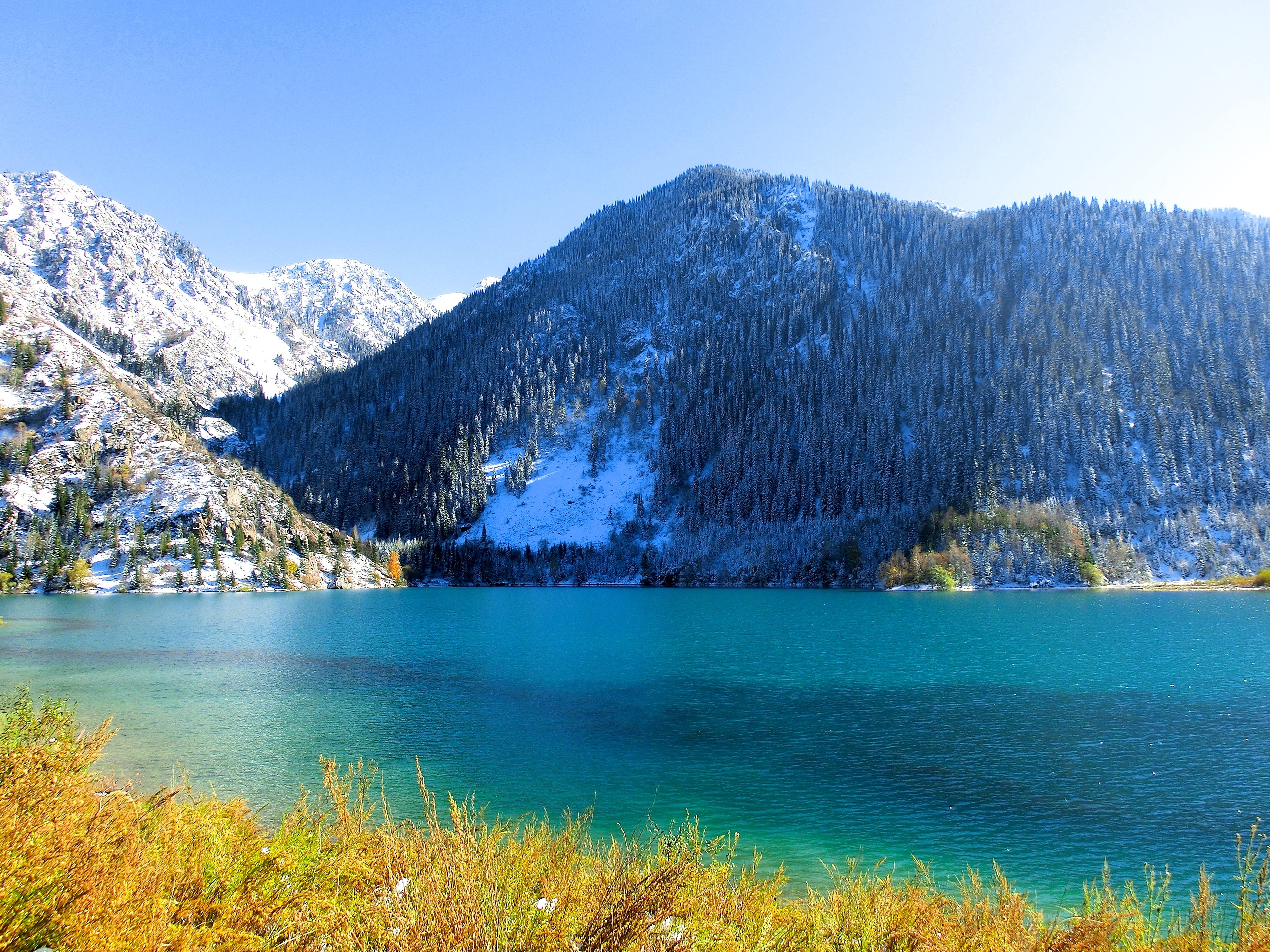 October snow and blue hues on Issyk Lake.