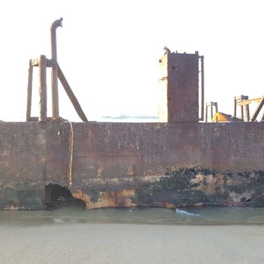 The barge seen during sunset. 