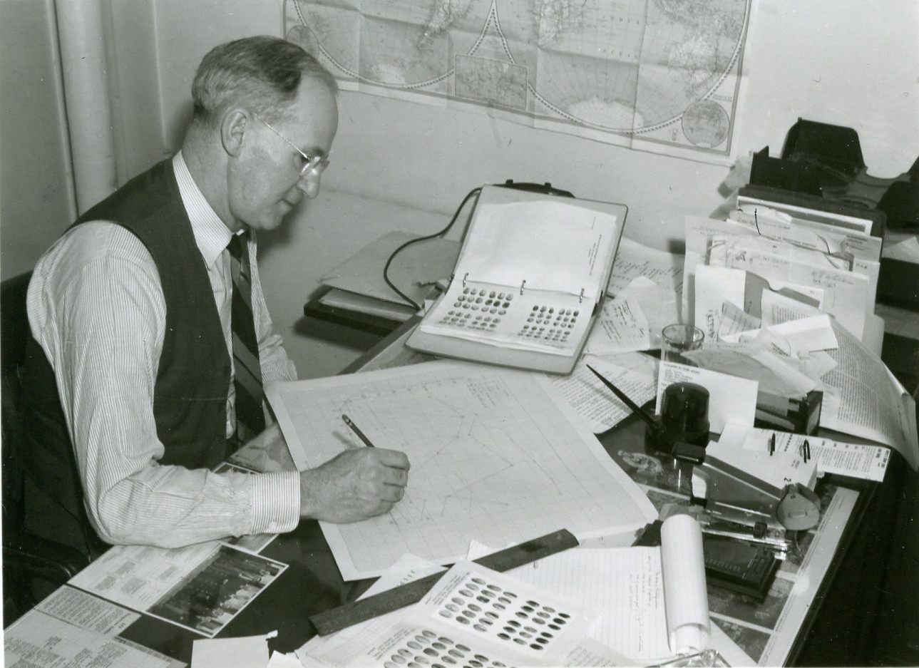 William E. Whitehouse, surrounded by images of pistachios.