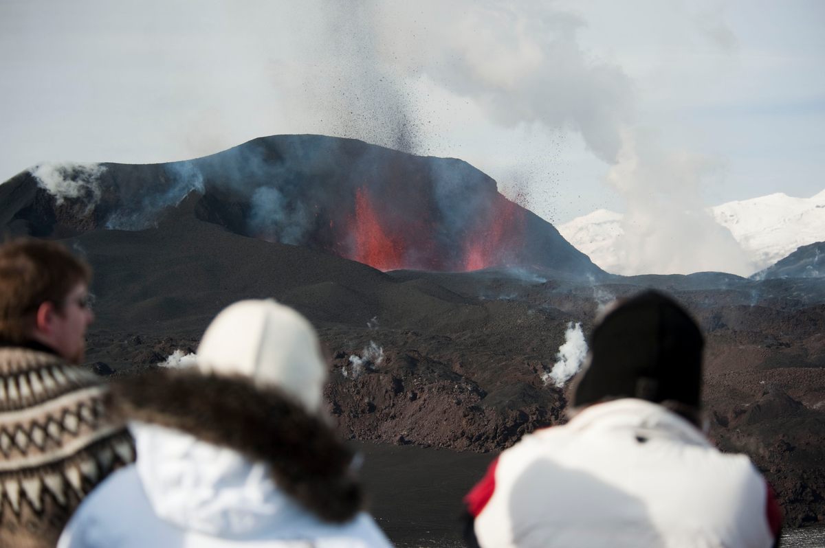 Eruptions sometimes attract crowds. This one gathered to watch a volcanic show in March 2010.