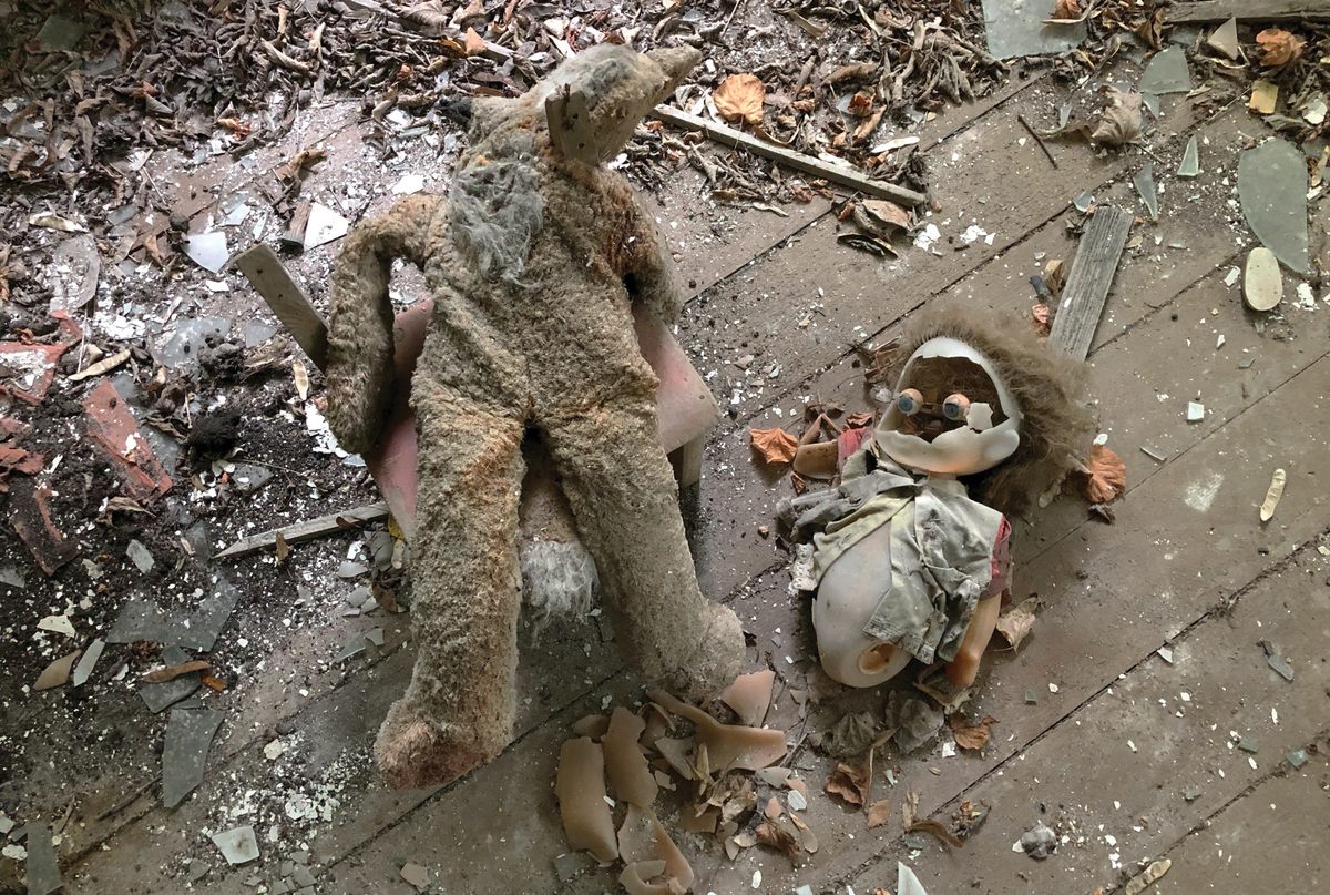 Visitors to the Vygribnaya Sloboda village school arranged toys for dramatic effect, a sight that is much more common in Ukraine's Exclusion Zone.