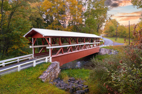 Check out the unique way the vertical beams fan out on this historical bridge.