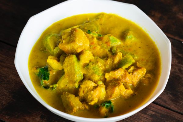 Order the dry curry with pork spareribs and green banana.