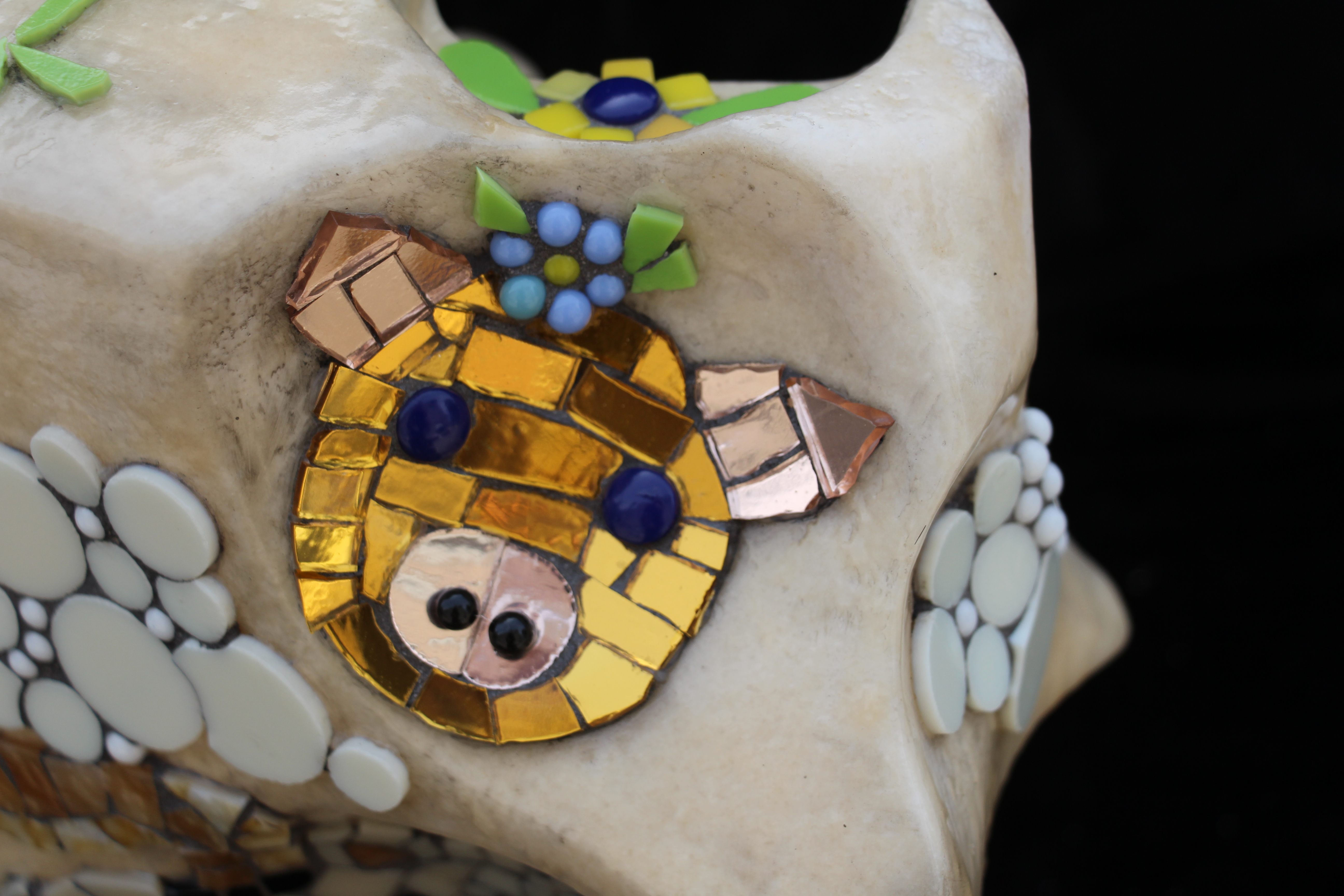 Kathy Pennington's mosaic-laden salt block, "Pigs Fly," took home second place in the "Forgery" category.