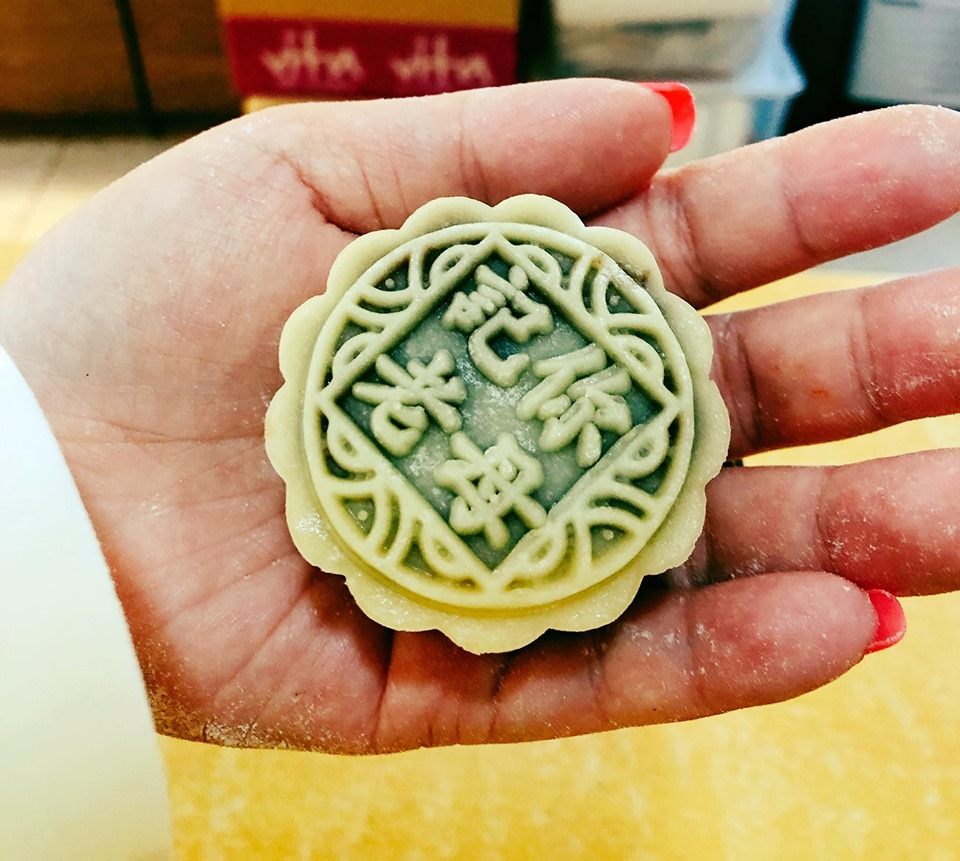 An "Reporter, my ass!" mooncake.