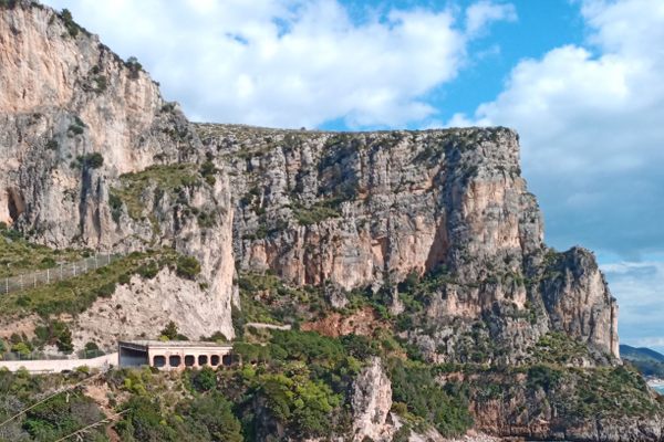 The modern Via Flacca set against the spectacular cliffs