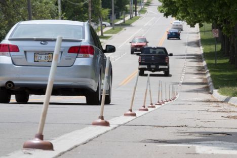 Some Cyclists in Omaha Improved a Bike Lane With 120 Plungers