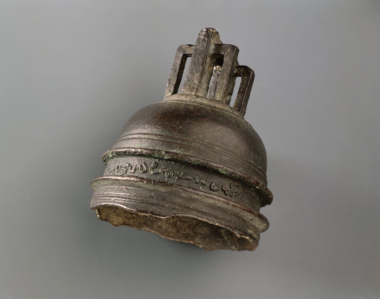 The Tamil Bell, the broken crown of a ship's bell embossed with Tamil script, has fascinated and perplexed scholars for more than a century.