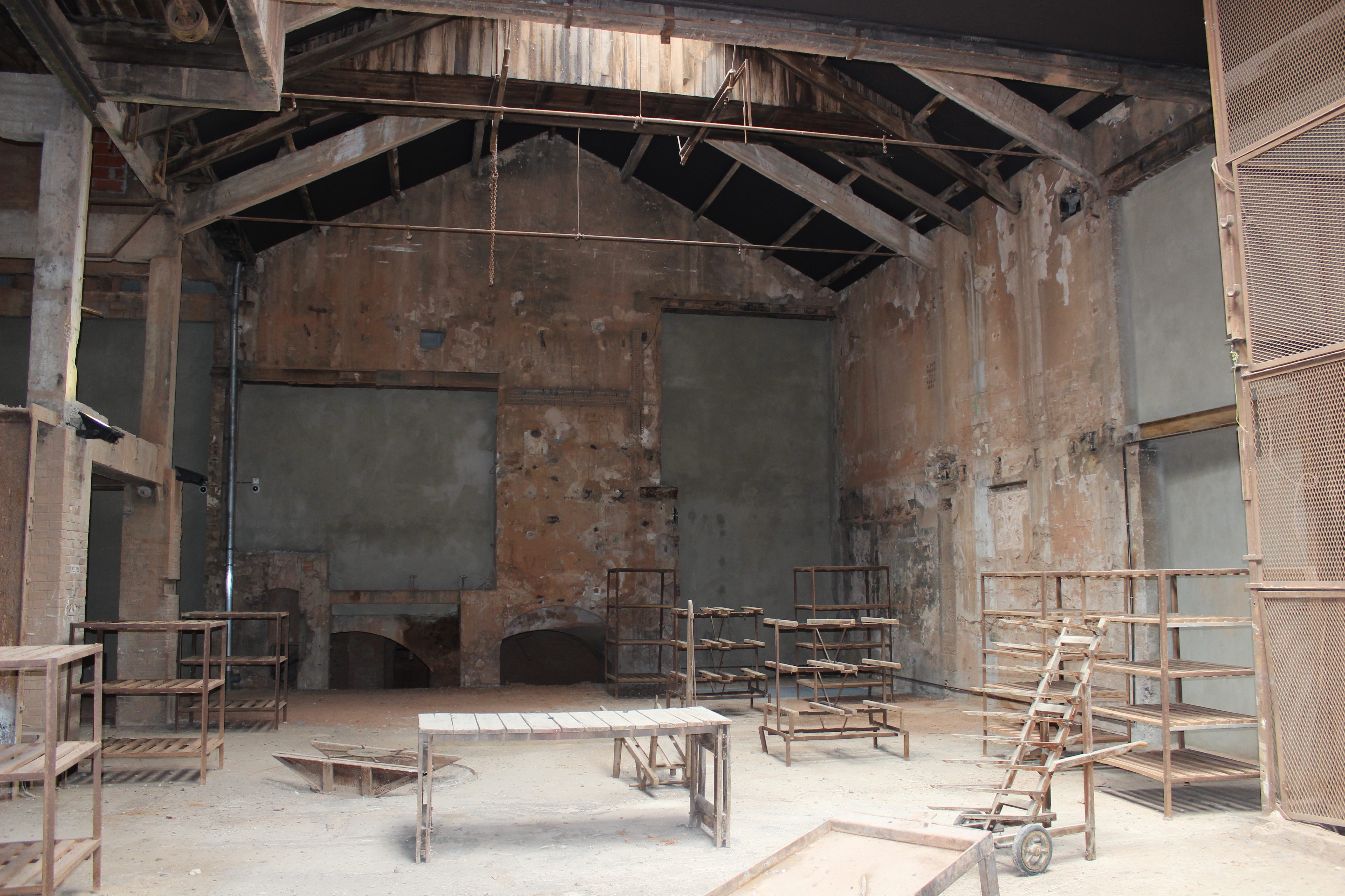 The tile pressing room turned performance space for the camp's larger productions