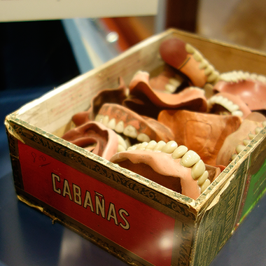 Displays at the Weaver Dental Museum include a jumble of dentures.