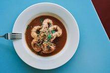 BBQ shrimp braised in beer are a popular menu item.