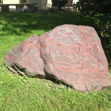 The stone sitting outside the 1100 North University Ave. Building