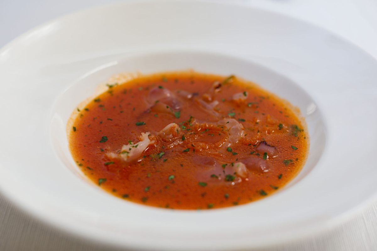 Chef Viva’s jellyfish soup in a broth of tomatoes, olive oil, garlic, and parsley.
