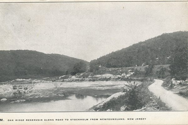 The ghost bridge is visible in the lower left portion of the photo. The current highway (Rt 23) is higher and closer to the bridge, than the dirt road here. Taken around 1900.