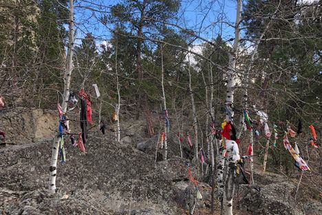 Many ceremonial items are left by visitors.