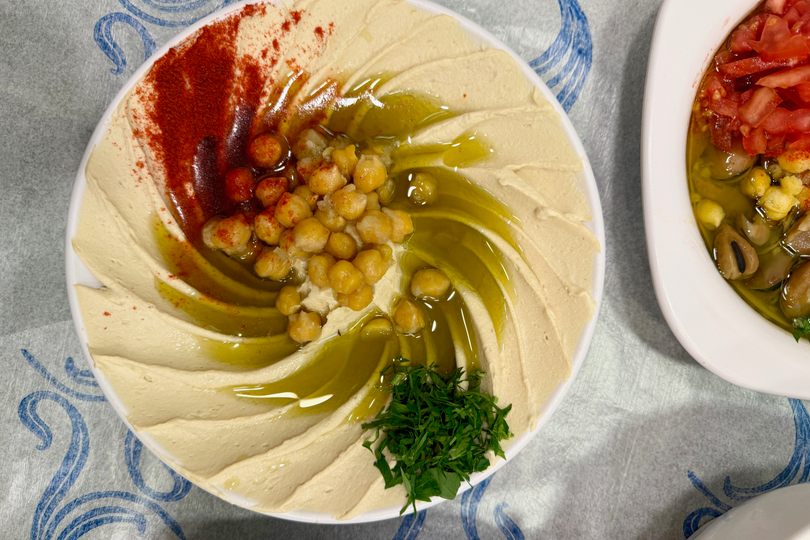 Lush, creamy hummus is a must-order.