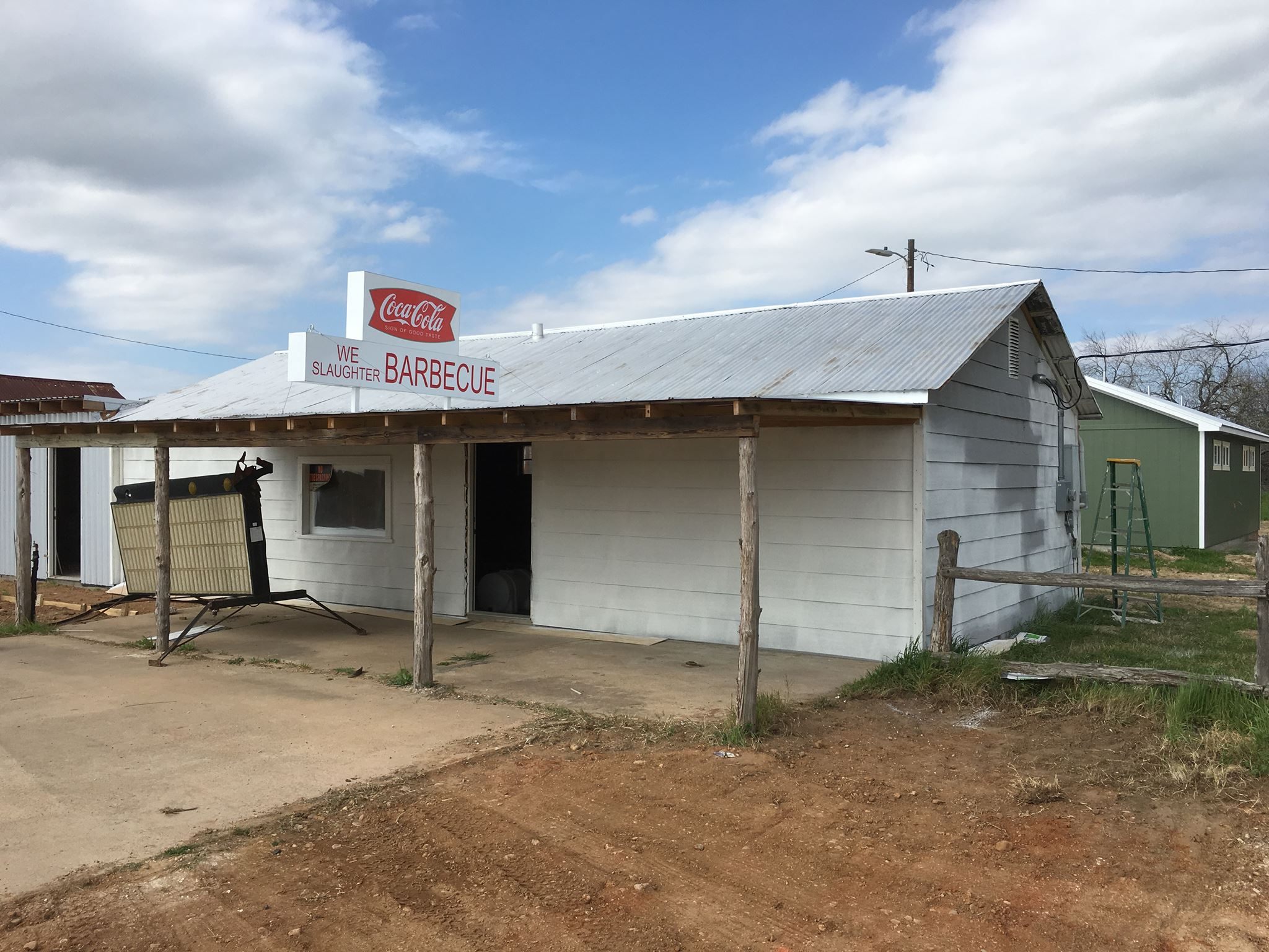 The Last Chance Gas Station at the beginning of its transformation into We Slaughter Barbecue