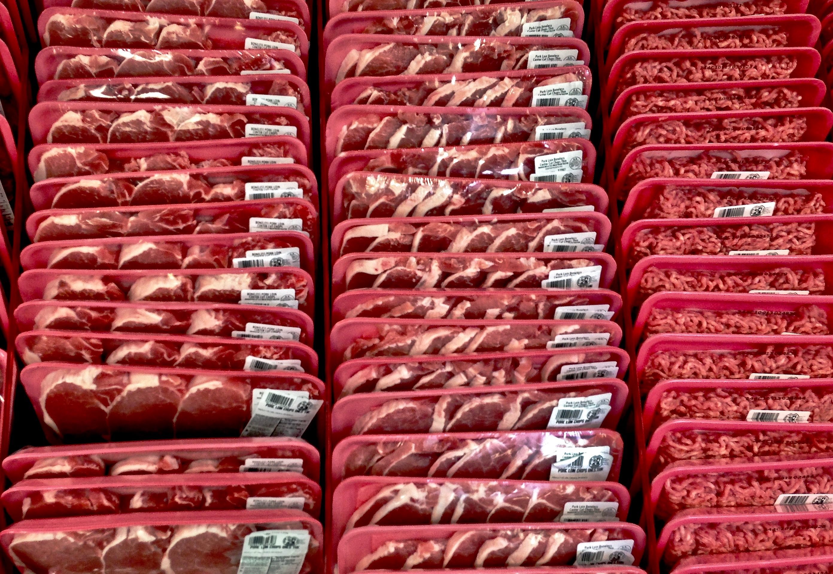 Meats on meats on meats at the grocery store.