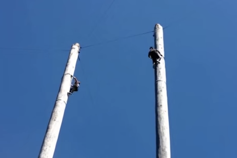 Watch These Guys Climb 80-Foot Poles in Just 13 Seconds