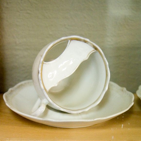 The small shelf allowed you to drink tea without damaging your mustache. 