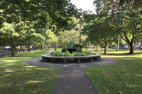 This serene garden and modest fountain marks the heart of Montcalm Park.
