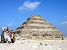 The Djoser Pyramid (4,700 years old) and a camel (age unknown). 