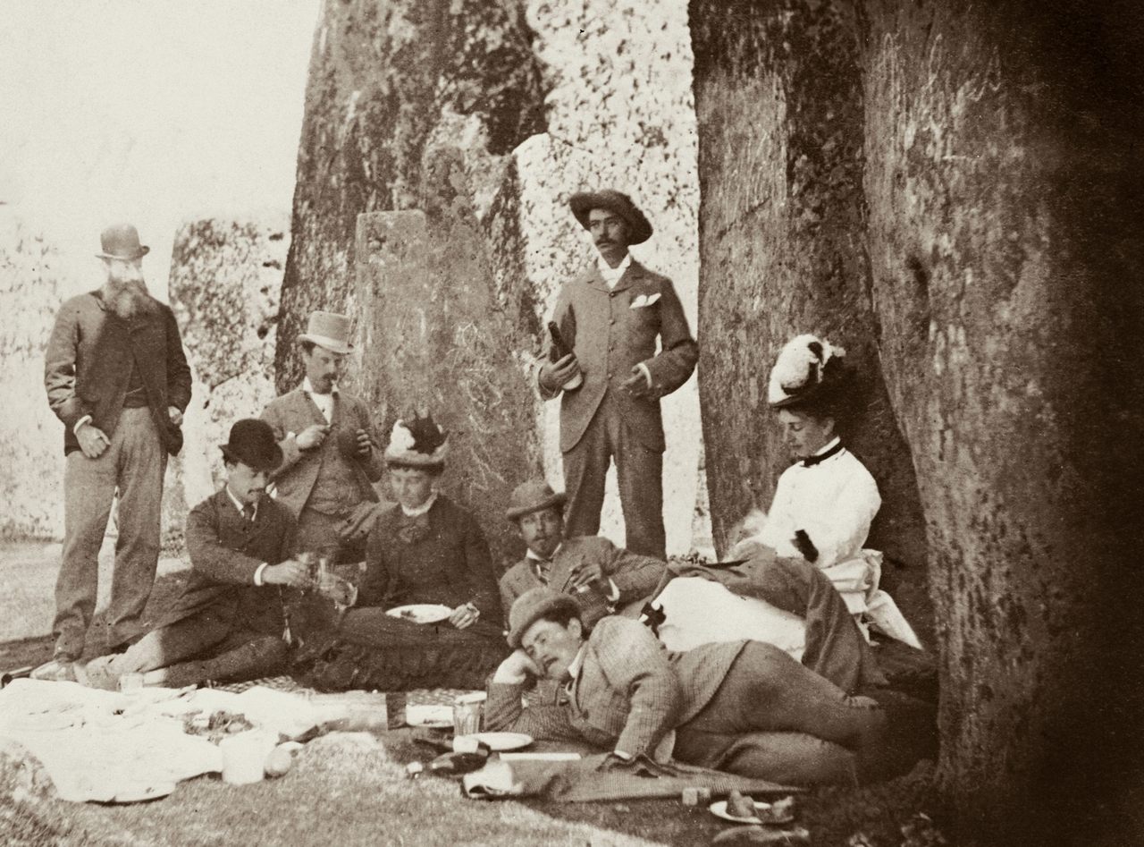 A picnic party at Stonehenge, including Queen Victoria's son Prince Leopold (reclining, looking towards camera), c. 1877
