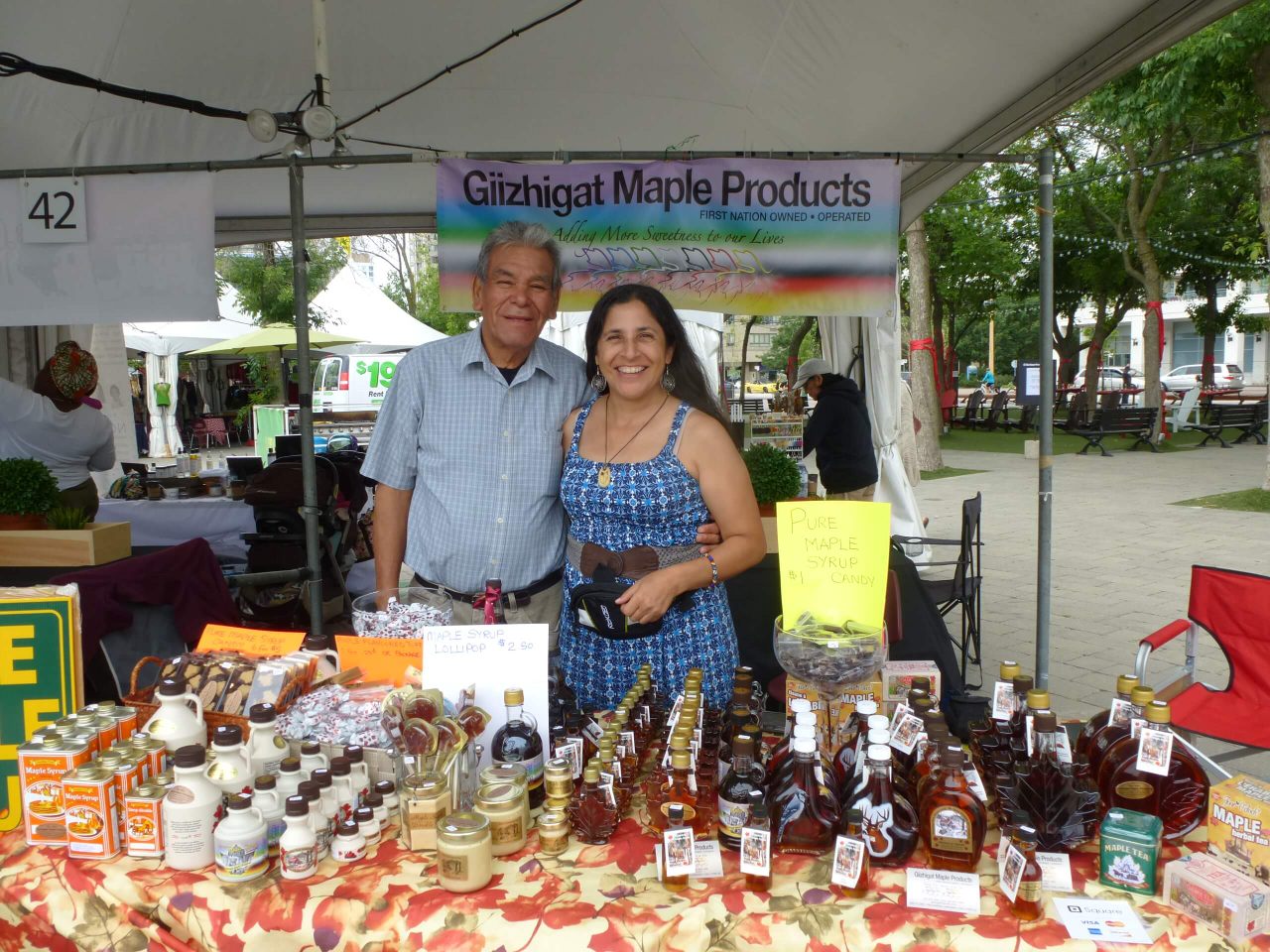 Isaac Day and Deborah Aaron, owners of Giizhigat Maple Products, at the 2020 Planet IndigenUs event in Toronto.