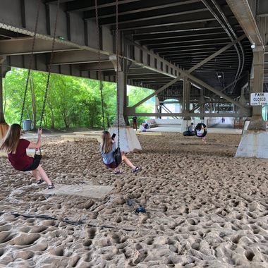 During the daytime, there are enough swings beneath the bridge that there's usually an open seat!