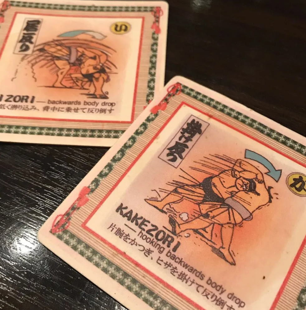Sumo wrestling cards at the shop depict different kimarite, or match-winning moves.