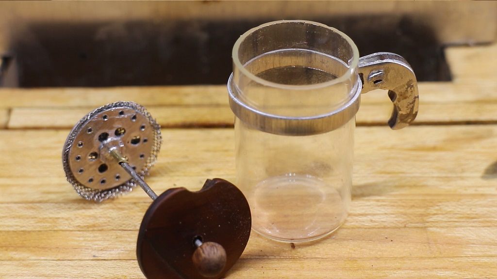 A thimble-sized French press, for caffeine haters.