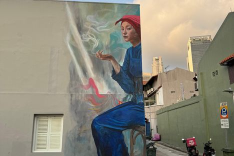 Samsui woman on a cigarette break.