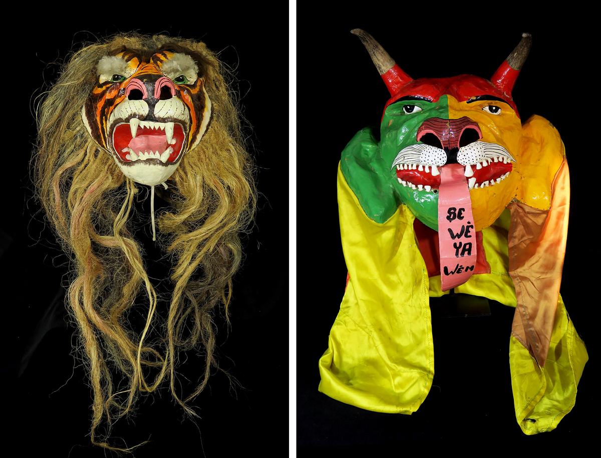 Tiger Carnival Mask, unknown artist, 1989 (left); “Se wè ya wèm” Diable Mask, unknown artist, 1989 (right).