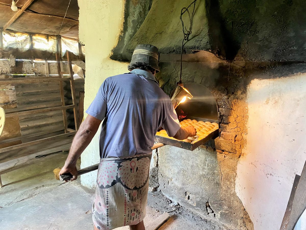 A baker makes some bread in Mihiripenna.