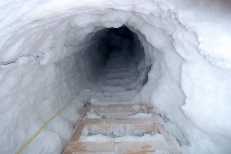 A frozen ladder leads to an escape hatch.