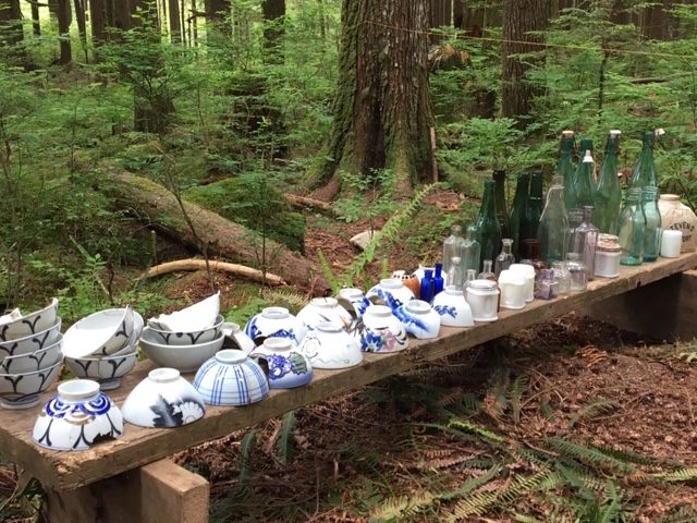 Bowls and bottles recovered from the site.