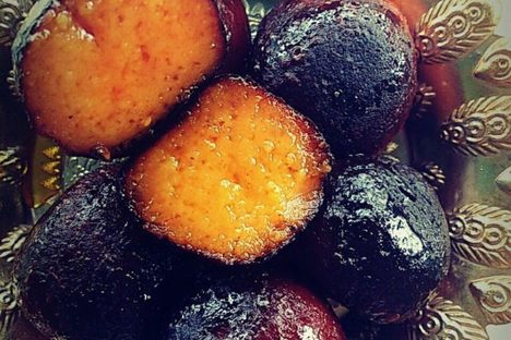 Kala is Hindi for "black," an apt descriptor for these inky fried balls.