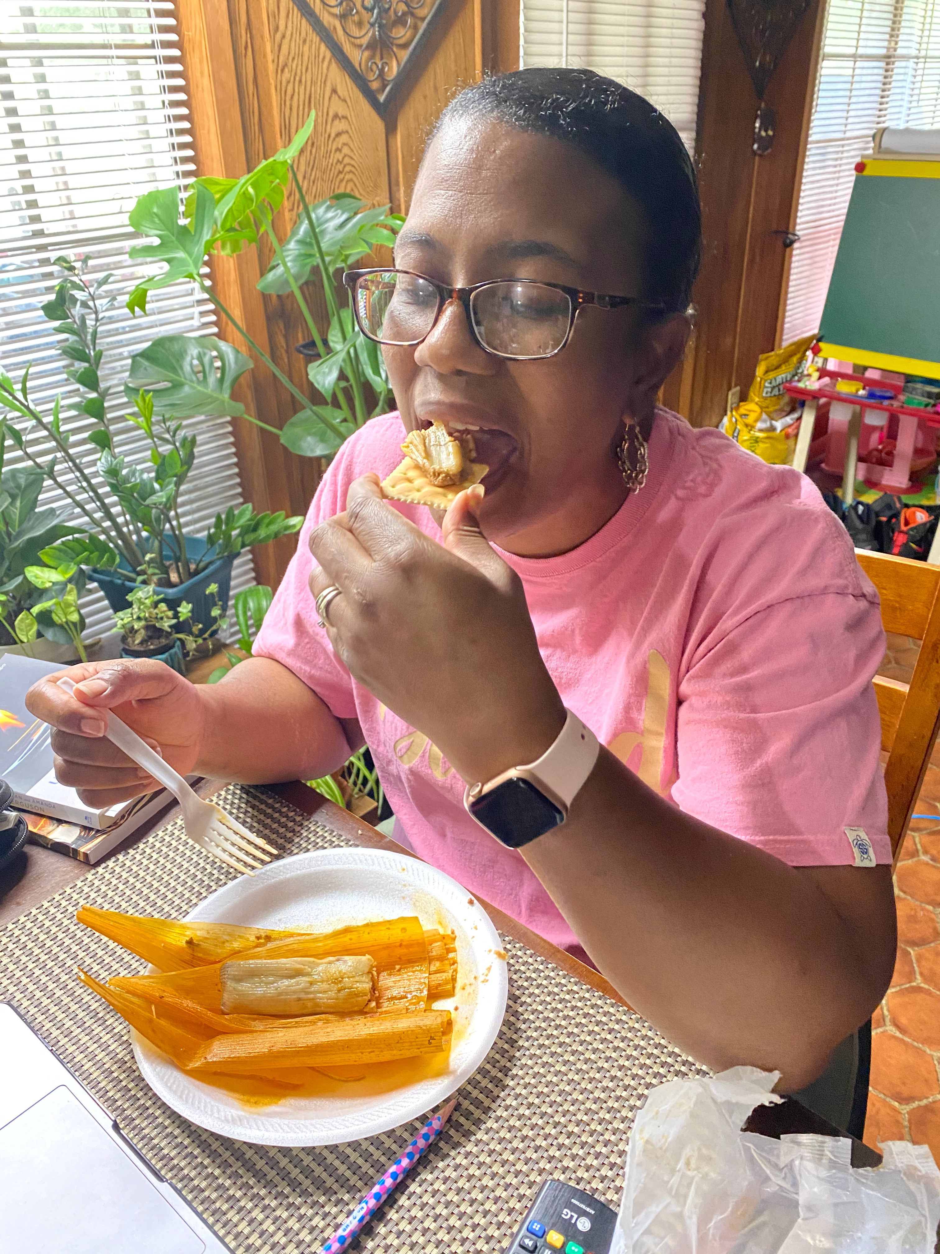 Belinda Sledge, Charles's wife, samples some hot tamale on a saltine cracker (a typical combination in the Delta.)