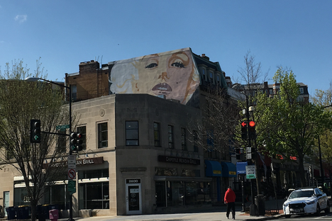 The Marilyn Monroe mural as seen from across the intersection.