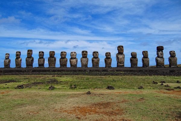 A row of stone monoliths, or moai, on Ahu Tongariki in Rapa Nui. 