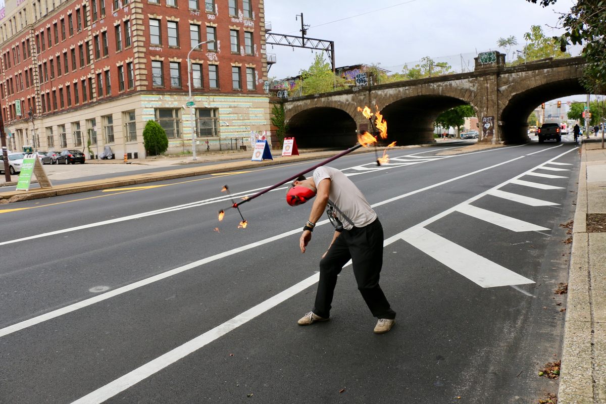 A performer plays with fire.