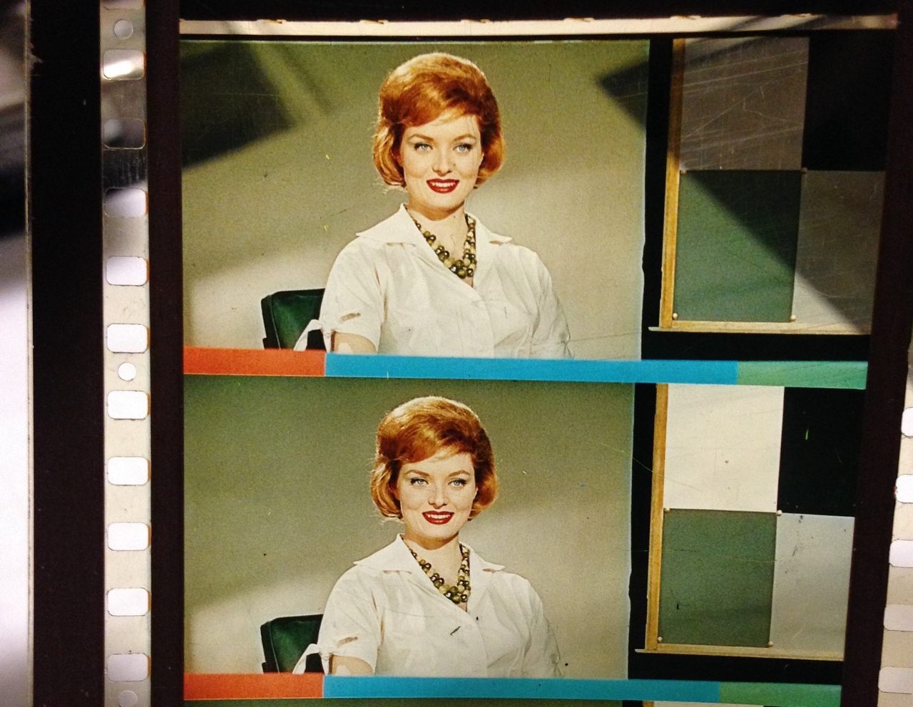 The format here is from a 70mm print, wide enough for her red bouffant.