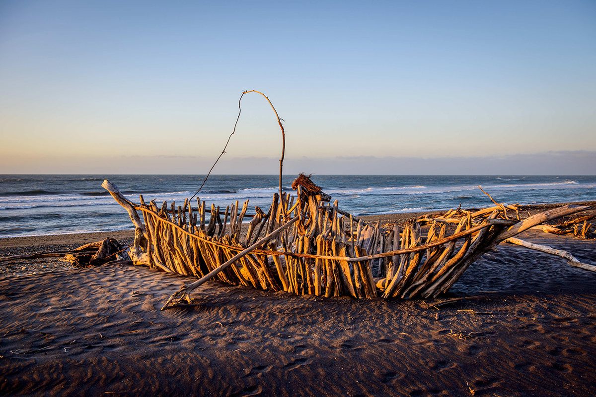 "Old Man of the Sea," a sculpture of a fisherman in a flotsam boat, built by Simon Pringle for the 2016 festival.