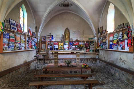 Rugby jerseys line the walls inside the chapel.