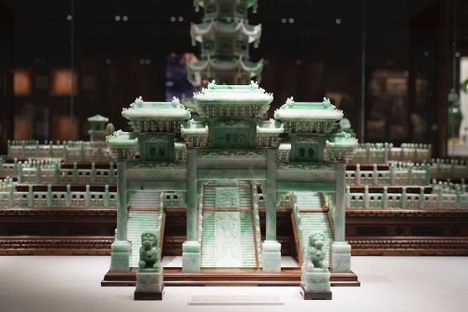 A separate gateway stands 16 inches tall in front of the pagoda, along with two guardian lions.