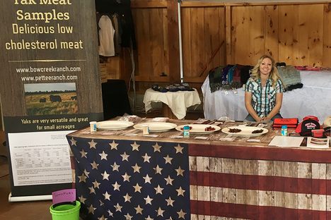 Danielle Garner at the tent at Yakapalooza for Bentwood Alpacas and Yaks.